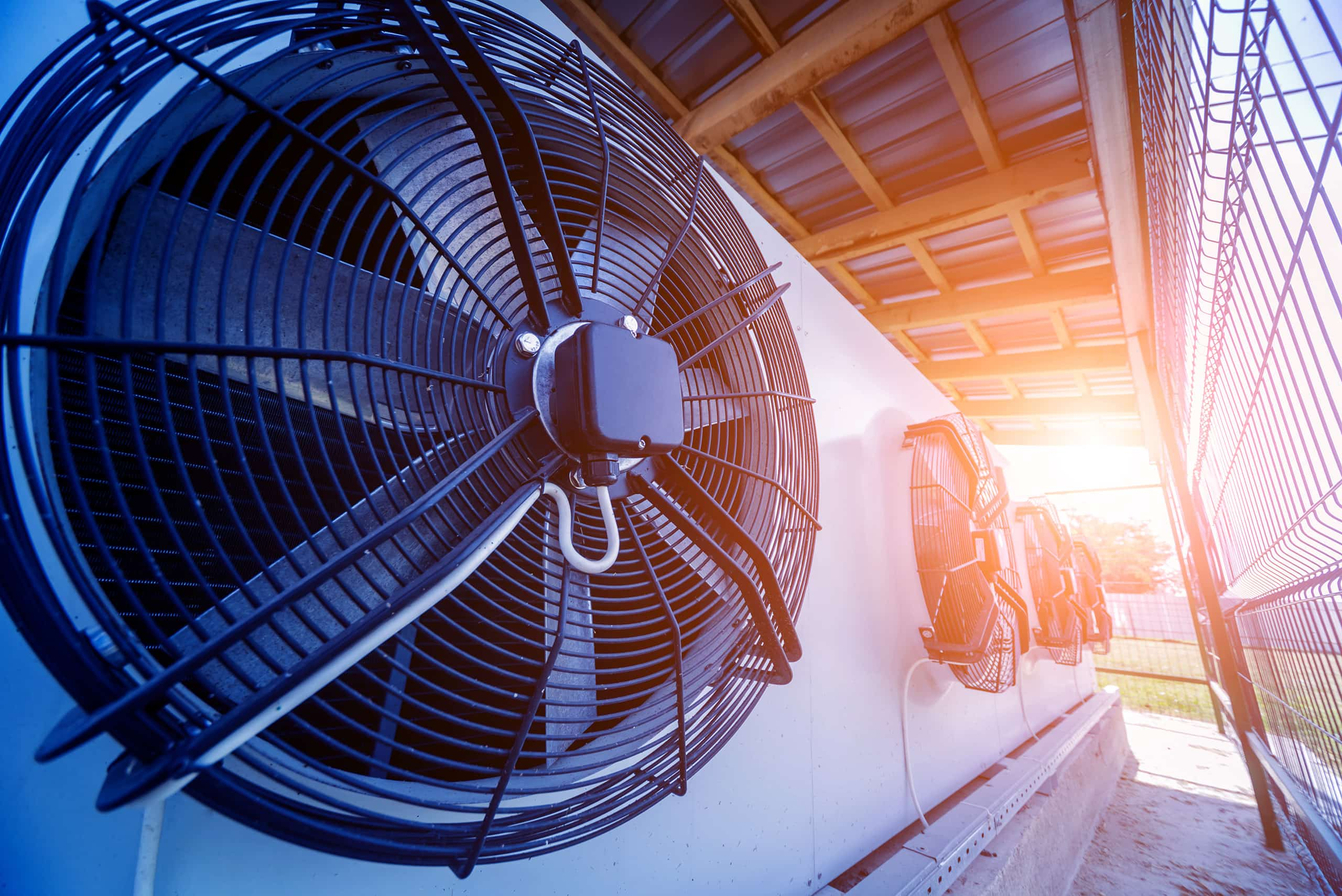 A large HVAC unit on the outside of a building